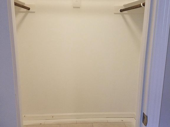 A closer look at one of the two walk-in closets in the maste