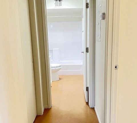 Hallway to bedrooms and bathroom