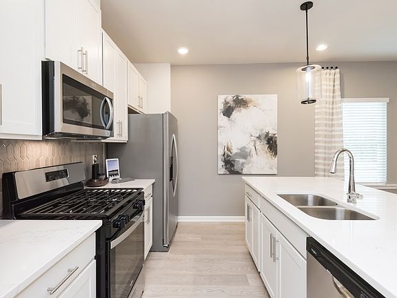 The Lancaster floorplan with the Lush White interior package modeled at Avalon.