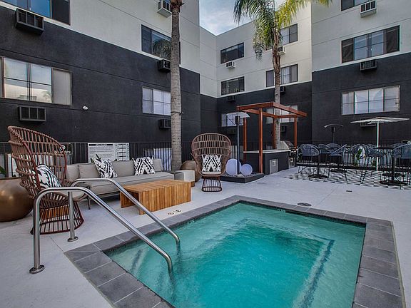 Newly Designed & Renovated Pool Deck with Swimming Pool, Hot Tub, Cabanas PLUS Grilling & Dining Area