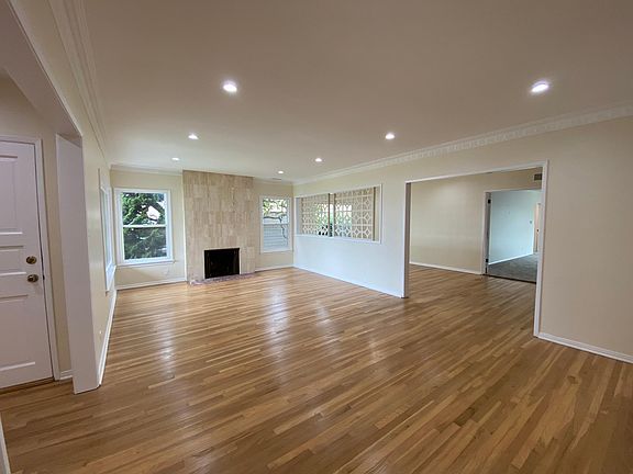 Living Room, to Dining Room & Family Room (Decorative Fireplace)