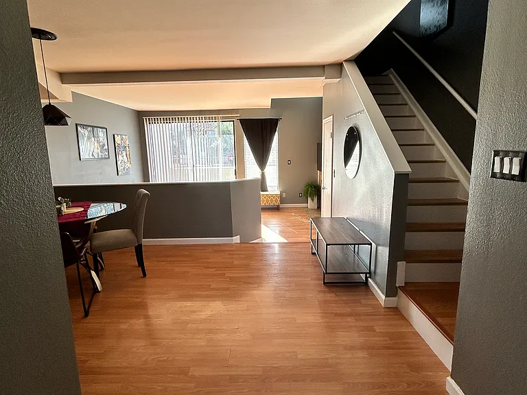 Entry showing stairs. Powder room to right of front door entrance
