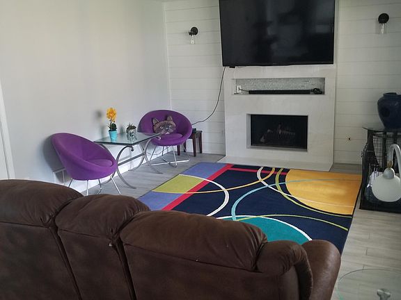 T.V. ROOM WITH NEW FIREPLACE