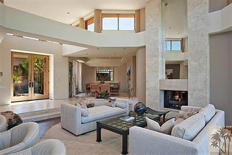 Great room opens to the formal dining room.