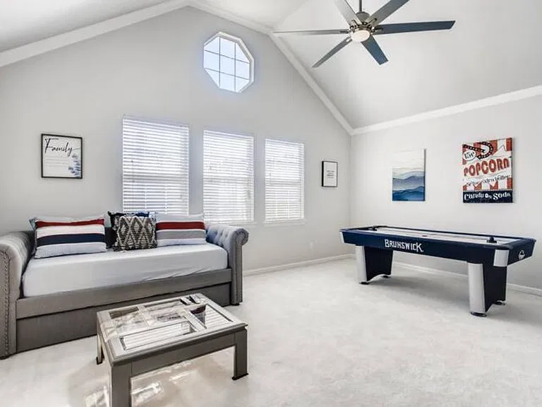 Another view of the game room / 5th bedroom