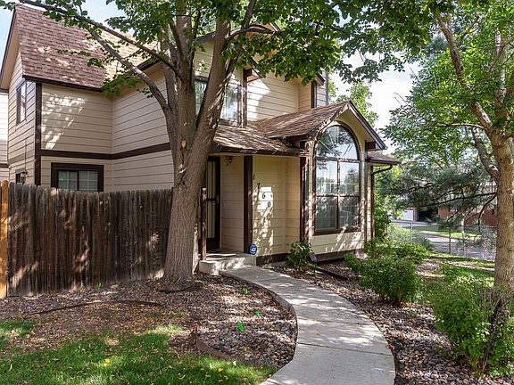 Such a lovely setting!  This completely detached condo lives like a town home!