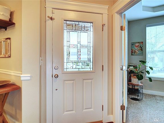 Beveled glass adorns the front entry door.  