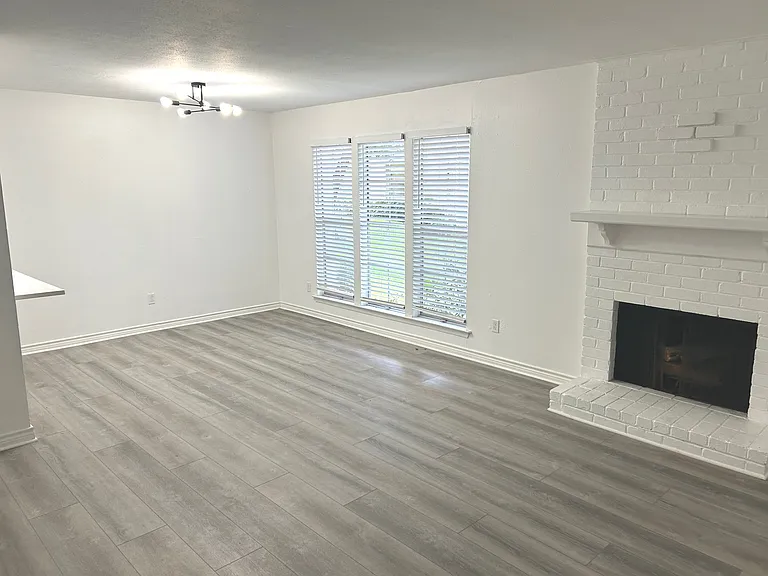 Living Room with decorative light and fire place