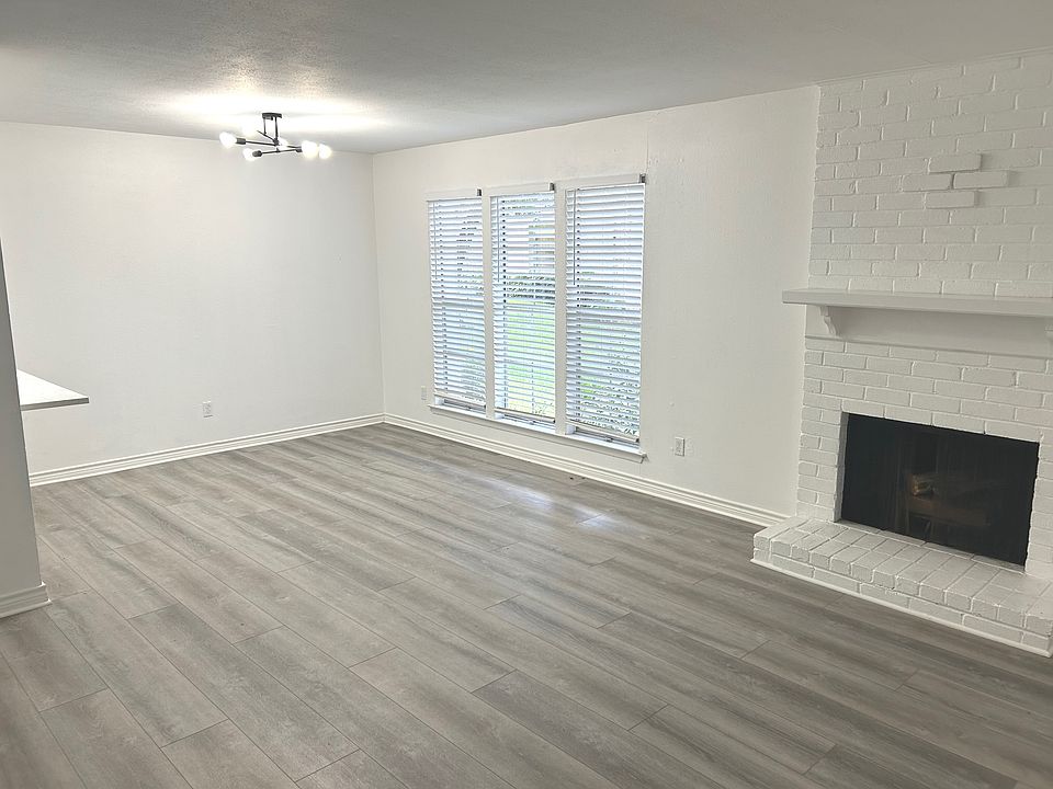 Living Room with decorative light and fire place
