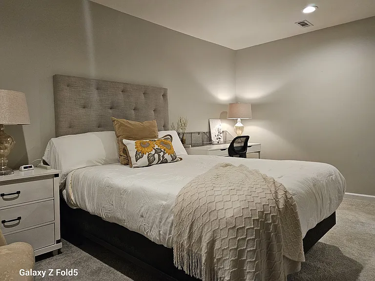 Comfortable mattress, West Elm headboard, casper box spring make for a restful night's sleep.
