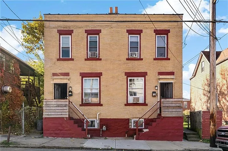7036-7038 Upland St photo 1