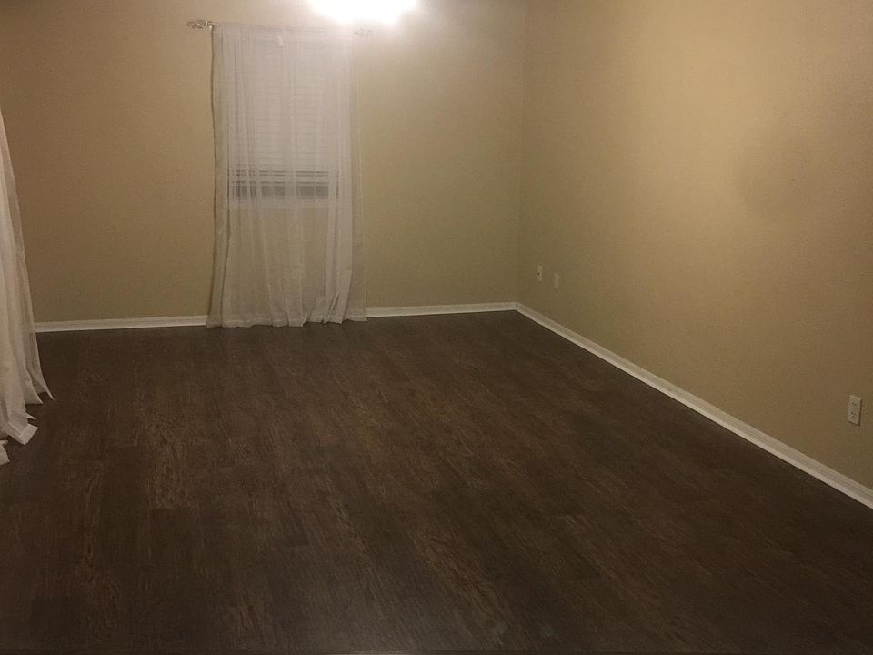 Living room with new flooring Unit B