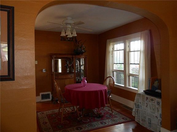 Sunny formal dining room.