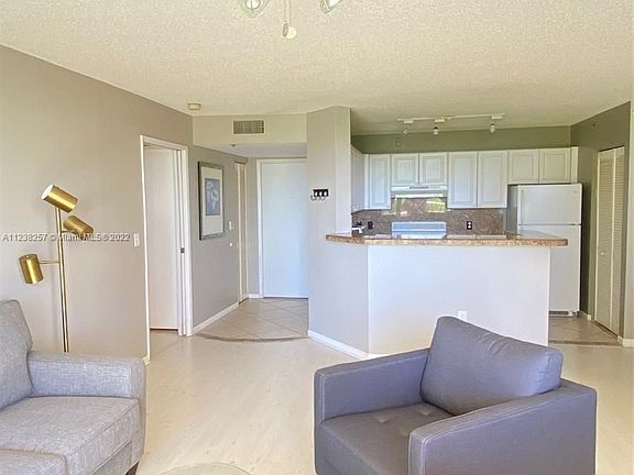 3rd image of 19601 E Country Club Dr #7404