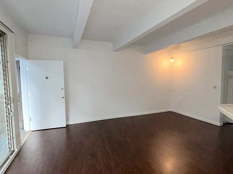 Welcome to your new home with original wood beam ceilings and wood flooring