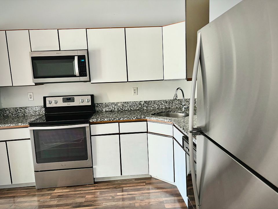 Updated kitchen!! New granite countertop, new stove, microwave ceiling fan, and light milk controlled new handles stainless steel if you open cabinet stainless steel sink faucet under cabinet lighting!
