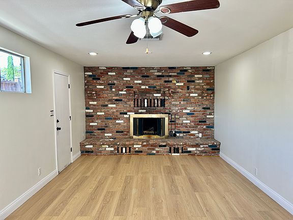 den with fully functional fireplace