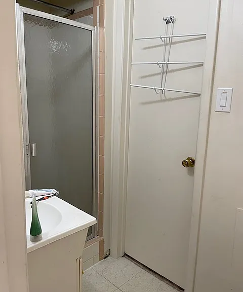 Back bathroom with shower