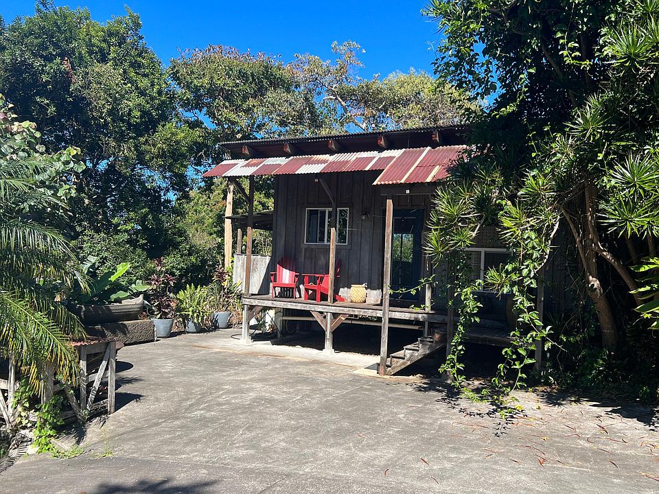 front of house and porch, front doors, seating, parking view