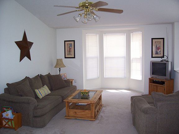 Open living area, bay windows, lots of light
