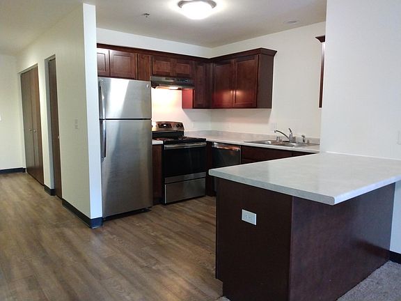 Beautiful kitchen with stainless steel appliances.