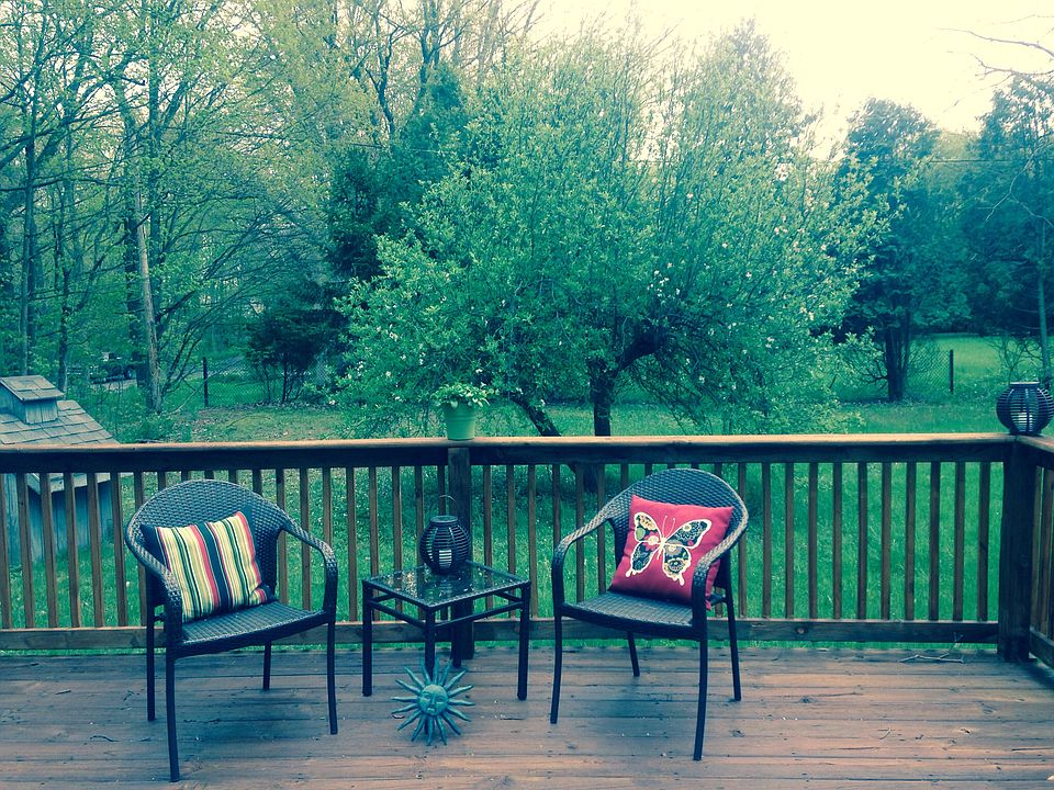 Deck w/ flowering apple tree