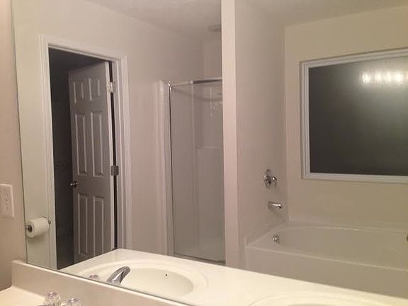 Master bathroom with seperate shower and garden tub