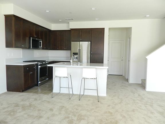 Brand new kitchen with granite counter tops and high end app