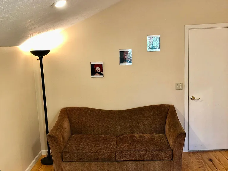 Cozy loveseat to snuggle up and read or relax in the privacy of your room.