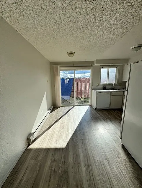 dining area thru kitchen to slider to backyard