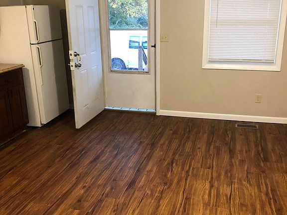 Entry way into living room / kitchen combo.