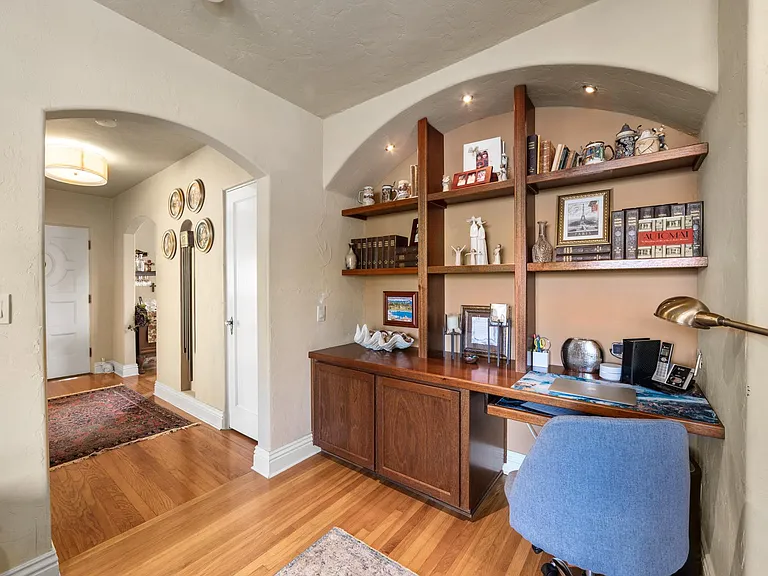 Office area with built-in desk