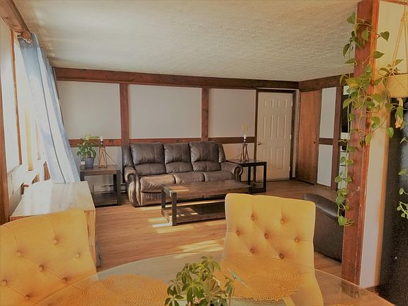 Living room with new flooring and freshly painted!