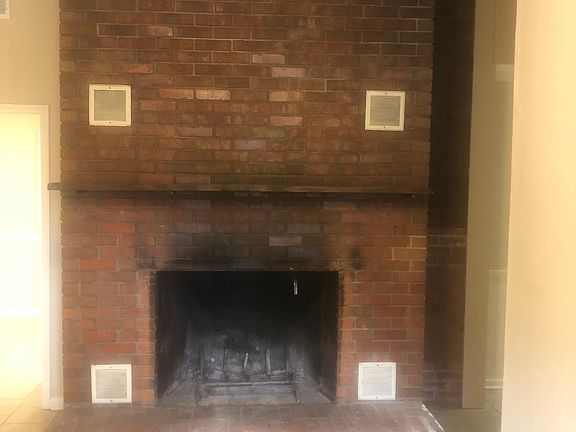 Fireplace in Living Room. This is a working fireplace.