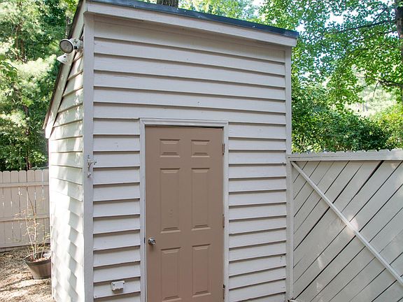 Outdoor shed for extra storage.