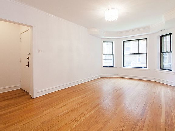 Large living Room overlooking the courtyard. Tons