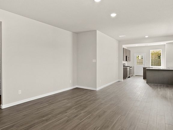 Family Room to Dining and Kitchen