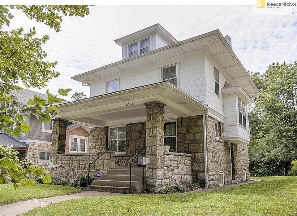 Classic midtown two-story just a nine-iron north of Westport Road.