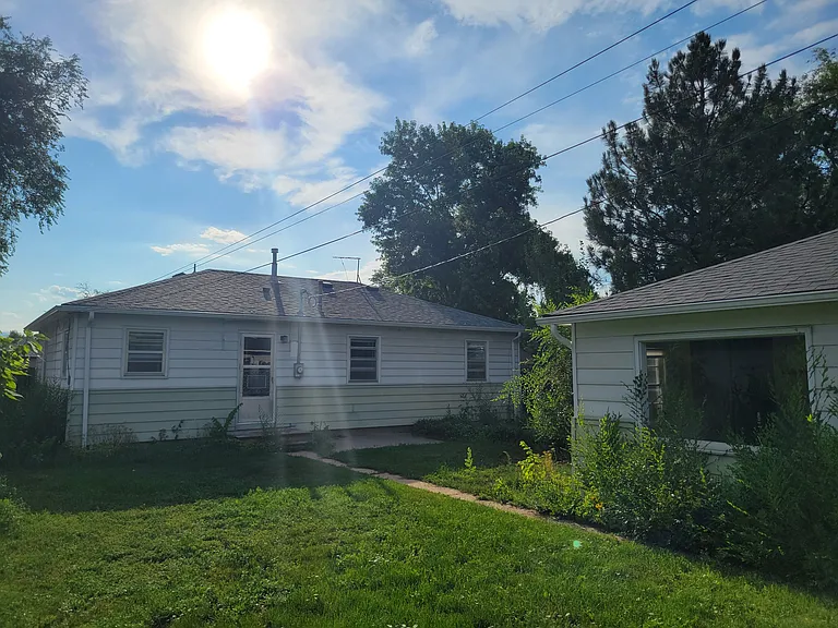 Back yard with studio on the right