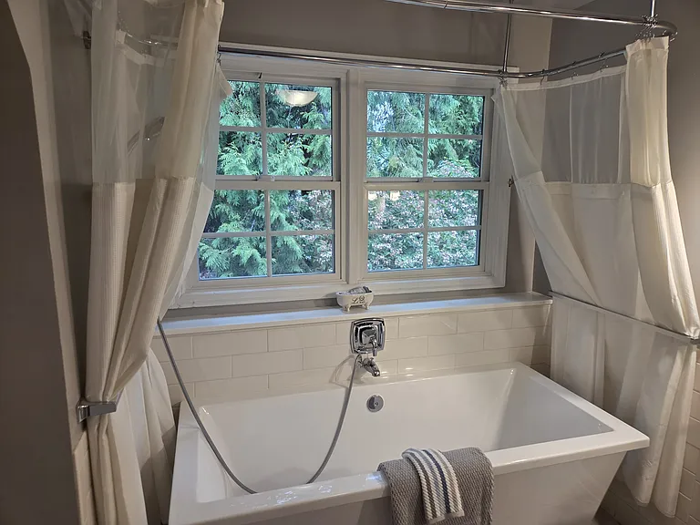 Imagine soaking away your daily activities in the upstairs tub, designed for a tranquil and restorative escape
