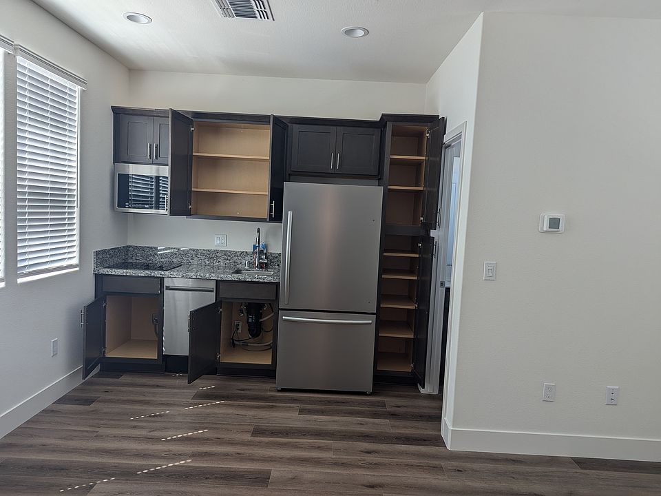 Kitchen. Door on the right is the bathroom.