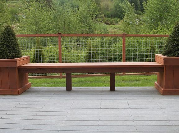 Trex deck with built in bench and planters.