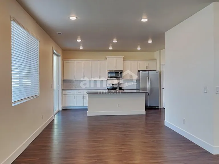 10032 W Raleigh St — Photo 4