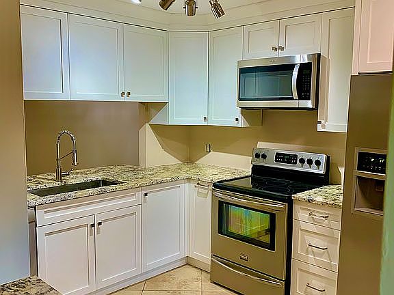 2nd image of 5676 Woodmere Lake Cir #D104