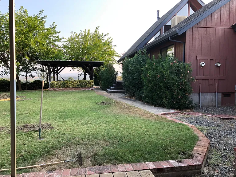 back of house,lawn and bbq area