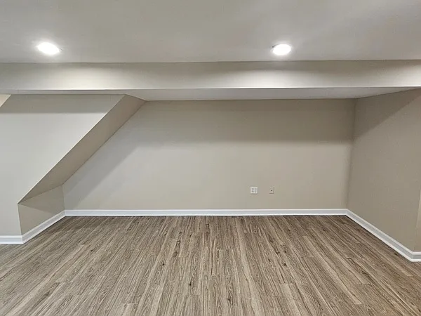 LOWER LEVEL FAMILY ROOM OR BEDROOM