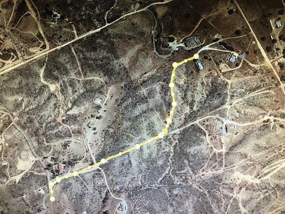 Well maintained dirt and gravel driveway.