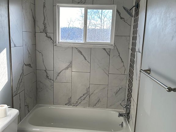 Tiled surround tub