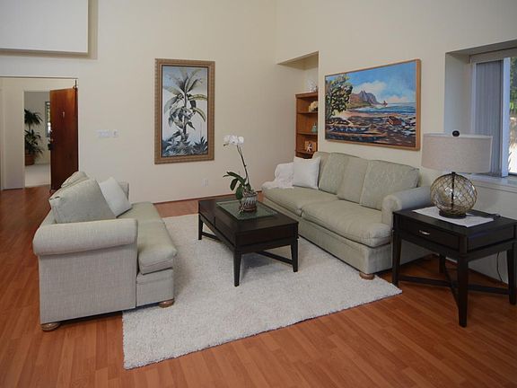 Spacious living room w/ cathedral ceilings