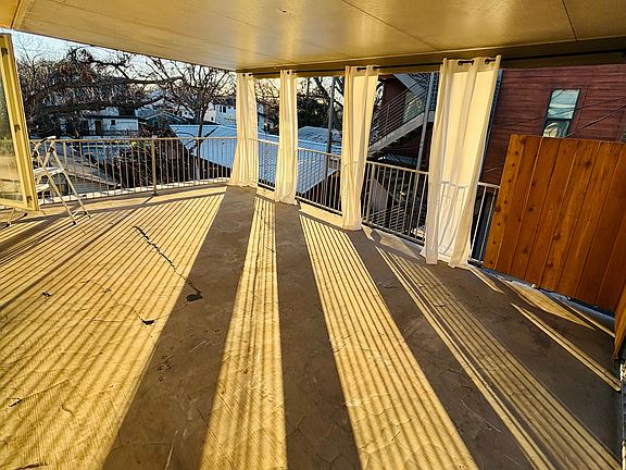 Beautiful upstairs porch. Lots of outdoor living space.